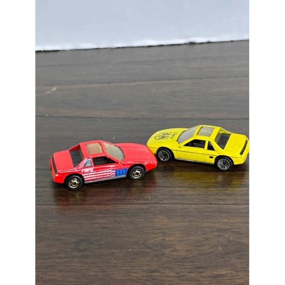 Vintage 1984 Hot Wheels Pontiac Fiero Lot of 2 Red American Flag & Yellow 1:64